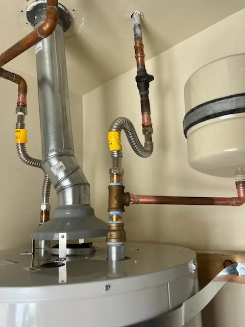 Water heater installation and plumbing repair in Tropico